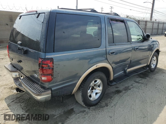 1998 Ford Expedition XLT with VIN 1FMRU17L8WLA61813, listed as a Copart auction lot 64687765 with 200,502 mi miles and Salvage title. Bid and sale history available at DreamBid. Image 3.