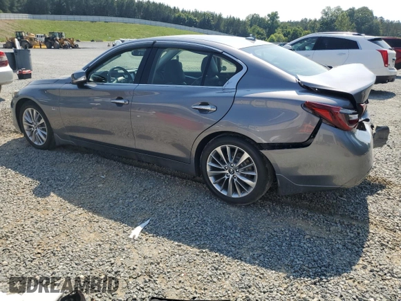 2018 Infiniti Q50 Luxe with VIN JN1EV7AR8JM443555, listed as a Copart auction lot 59691455 with 65,615 mi miles and Salvage title. Bid and sale history available at DreamBid. Image 2.