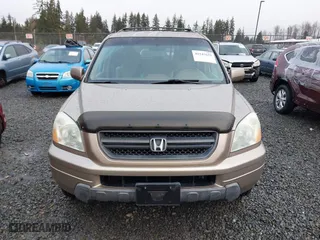 2004 Honda Pilot EX with VIN 2HKYF18694H538107, listed as a IAAI auction lot 41547655 with 254,755 mi miles. Bid and sale history available at carsss.com. Image 12.