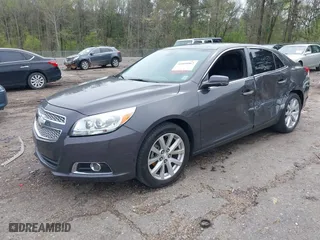 2013 Chevrolet Malibu LTZ with VIN 1G11H5SA5DF267940, listed as a IAAI auction lot 41854067 with 159,946 mi miles. Bid and sale history available at carsss.com. Image 2.