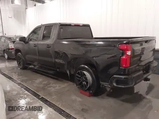 2021 Chevrolet Silverado 1500 RST with VIN 1GCRYEEDXMZ135111, listed as a IAAI auction lot 41398152 with 54,051 mi miles and . Bid and sale history available at DreamBid. Image 3.