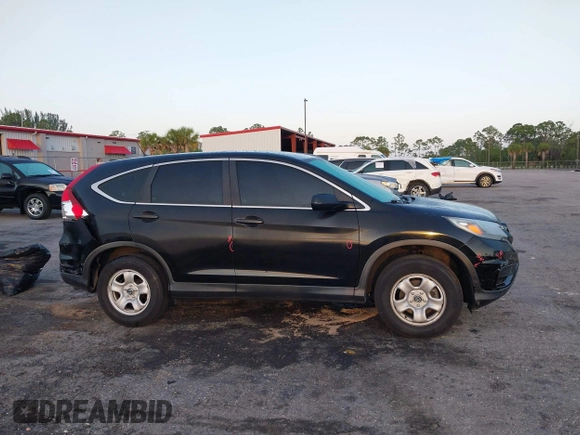 2015 Honda CR-V LX with VIN 5J6RM4H35FL038634, listed as a IAAI auction lot 41968956 with 149,407 mi miles and . Bid and sale history available at DreamBid. Image 13.