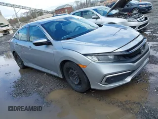 2019 Honda Civic LX with VIN 19XFC2F61KE009471, listed as a IAAI auction lot 42017532 with 81,134 mi miles and . Bid and sale history available at DreamBid. Image 1.