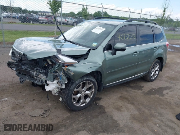 2015 Subaru Forester Touring with VIN JF2SJAWC9FH561581, listed as a IAAI auction lot 42237512 with 109,210 mi miles and . Bid and sale history available at DreamBid. Image 17.