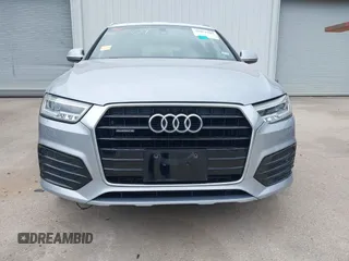 2018 Audi Q3 Premium Plus z VIN WA1JCCFS8JR023281, wystawiony jako IAAI lot #42071289 z przebiegiem 71 335 mil mil oraz . Historia ofert i sprzedaży dostępna na DreamBid. Obrazek 13.