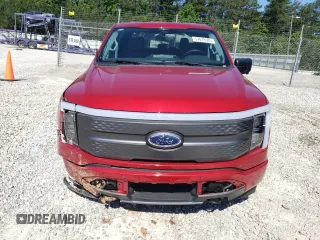 2023 Ford F-150 Lightning Pro z VIN 1FTVW1EL5PWG08844, wystawiony jako Copart lot #57673505 z przebiegiem 20 001 mil mil oraz Szkoda całkowita • Salvage title. Historia ofert i sprzedaży dostępna na DreamBid. Obrazek 5.