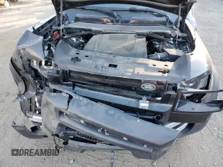 2023 Land Rover Defender S with VIN SALEJ7EX3P2121582, listed as a Copart auction lot 77433164 with 26,507 mi miles and Salvage title. Bid and sale history available at DreamBid. Image 12.