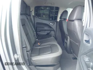 2021 GMC Canyon 4WD AT4 z VIN 1GTG6FEN8M1275345, wystawiony jako IAAI lot #42045878 z przebiegiem 68 299 mil mil oraz . Historia ofert i sprzedaży dostępna na DreamBid. Obrazek 8.