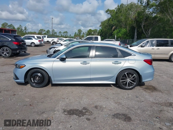 2023 Honda Civic Touring with VIN 2HGFE1F91PH305053, listed as a IAAI auction lot 42378311 with 41,576 mi miles and . Bid and sale history available at DreamBid. Image 15.