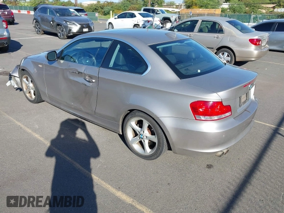 2011 BMW 1 Series 128i with VIN WBAUP7C53BVP21588, listed as a IAAI auction lot 41484300 with 52,124 mi miles. Bid and sale history available at carsss.com. Image 3.