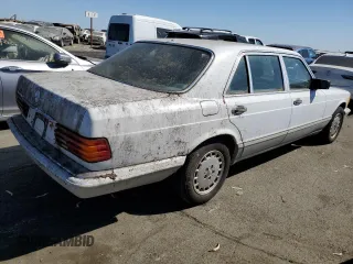 1991 Mercedes-Benz 420 with VIN WDBCA35E9MA597051, listed as a Copart auction lot 69926944 with 160,717 mi miles and Clean Title. Bid and sale history available at carsss.com. Image 3.