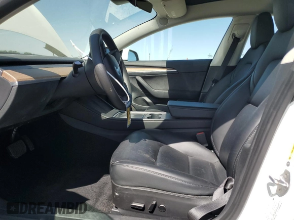 2023 Tesla Model 3 с VIN 5YJ3E1EAXPF541042, выставлен на аукционе Copart как лот 52898805 с пробегом 59 724 миль миль и Списание • Salvage title. История ставок и продаж доступна на DreamBid. Изображение 7.