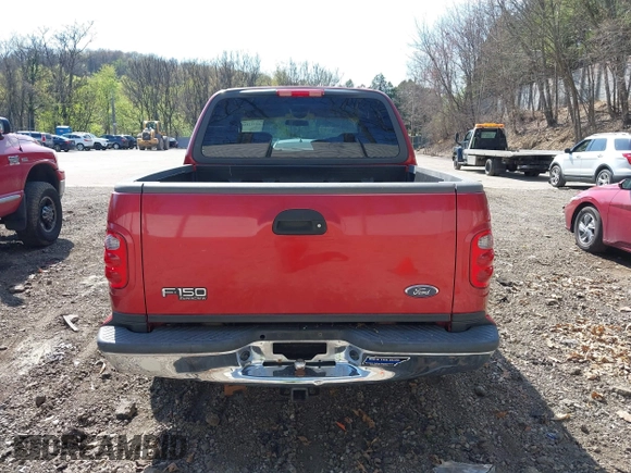 2003 Ford F-150 XLT with VIN 1FTRW07L13KD81923, listed as a IAAI auction lot 42112168 with 147,039 mi miles. Bid and sale history available at carsss.com. Image 17.