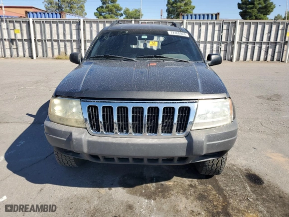 1999 Jeep Grand Cherokee Laredo with VIN 1J4GW58SXXC786179, listed as a Copart auction lot 79774564 with 272,192 mi miles and Salvage Title. Bid and sale history available at carsss.com. Image 5.