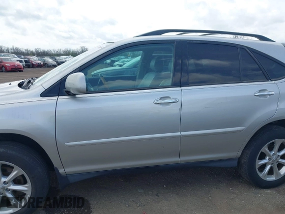 2008 Lexus RX with VIN 2T2HK31U58C053306, listed as a IAAI auction lot 42066973 with 184,266 mi miles. Bid and sale history available at carsss.com. Image 14.