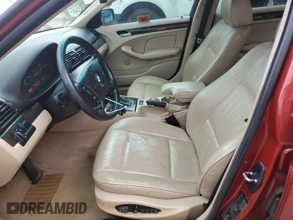 2000 BMW 3 Series 323i with VIN WBAAM3345YFP82665, listed as a Copart auction lot 59935495 with 174,688 mi miles and Salvage title. Bid and sale history available at DreamBid. Image 7.