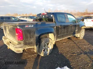 2020 Chevrolet Colorado 4WD Z71 with VIN 1GCGTDEN0L1133549, listed as a IAAI auction lot 41187716 with 74,743 mi miles and . Bid and sale history available at DreamBid. Image 4.