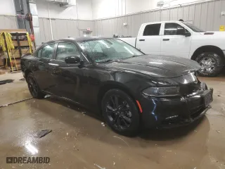 2022 Dodge Charger SXT with VIN 2C3CDXJGXNH203619, listed as a Copart auction lot 84207854 with 60,002 mi miles and Salvage Title. Bid and sale history available at carsss.com. Image 4.