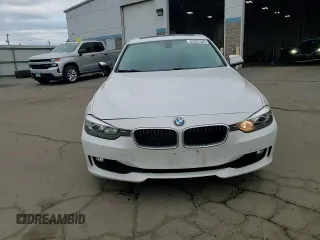 2013 BMW 3 Series 320i xDrive with VIN WBA3C3C5XDF982732, listed as a Copart auction lot 62852385 with 134,466 mi miles and Salvage title. Bid and sale history available at DreamBid. Image 14.