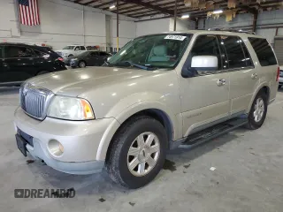 2004 Lincoln Navigator Luxury with VIN 5LMFU27R44LJ21559, listed as a Copart auction lot 74971914 with 179,213 mi miles and Salvage Title. Bid and sale history available at carsss.com. Image 1.