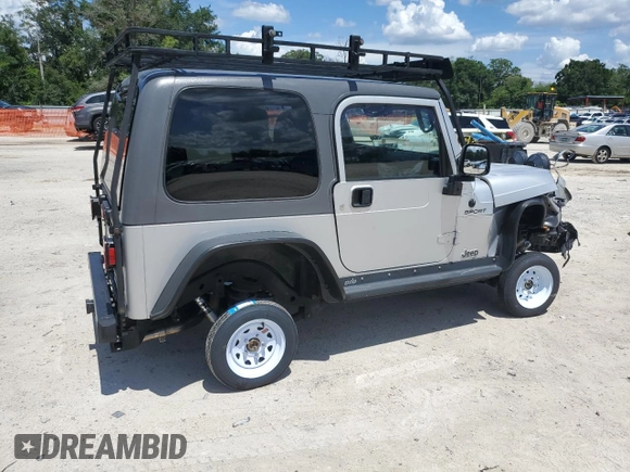2005 Jeep Wrangler Sport z VIN 1J4FA49S75P324462, wystawiony jako Copart lot #59818995 z przebiegiem 183 558 mil mil oraz Nie do naprawy • Non repairable. Historia ofert i sprzedaży dostępna na DreamBid. Obrazek 3.