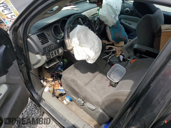 2010 Toyota Tacoma PreRunner with VIN 5TEJU4GN7AZ711911, listed as a Copart auction lot 60200385 with 209,579 mi miles and Salvage title. Bid and sale history available at DreamBid. Image 8.
