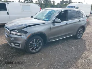 2014 BMW X5 xDrive35i with VIN 5UXKR0C52E0K50710, listed as a IAAI auction lot 40529606 with 114,307 mi miles. Bid and sale history available at carsss.com. Image 17.