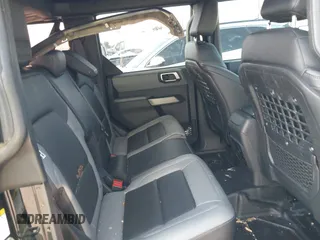 2022 Ford Bronco z VIN 1FMEE5BP3NLA74562, wystawiony jako IAAI lot #42338666 z przebiegiem 20 743 mil mil oraz . Historia ofert i sprzedaży dostępna na DreamBid. Obrazek 8.