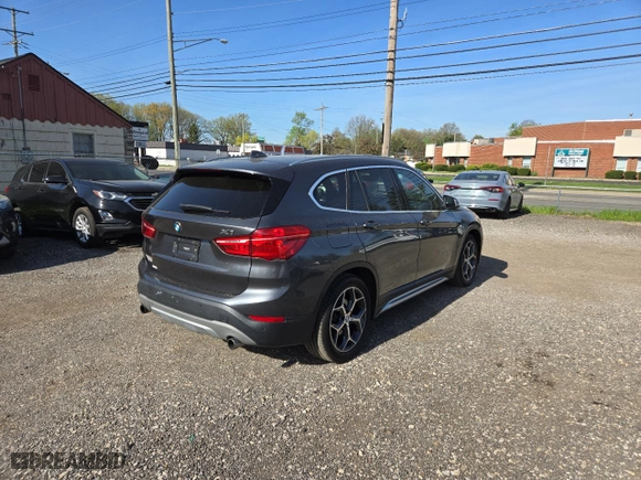 2017 BMW X1 xDrive28i with VIN WBXHT3C32H5F79305, listed as a Copart auction lot 54665865 with 113,046 mi miles and Clean Title. Bid and sale history available at carsss.com. Image 4.