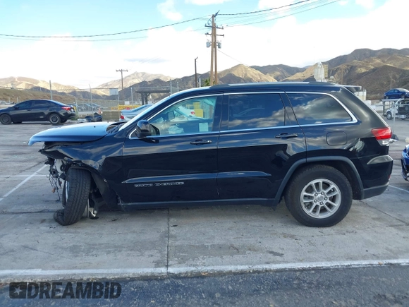 2020 Jeep Grand Cherokee Altitude with VIN 1C4RJEAG5LC182150, listed as a IAAI auction lot 41579551 with 57,789 mi miles and . Bid and sale history available at DreamBid. Image 14.