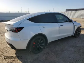 2020 Tesla Model Y Long Range with VIN 5YJYGDEFXLF034617, listed as a Copart auction lot 53235235 with 113,480 mi miles and Salvage Title. Bid and sale history available at DreamBid. Image 3.