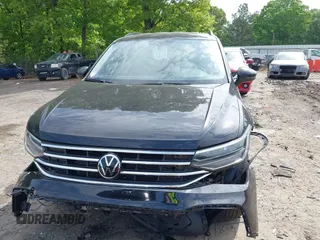2023 Volkswagen Tiguan S with VIN 3VVRB7AX6PM108735, listed as a IAAI auction lot 42108217 with 13,279 mi miles and . Bid and sale history available at DreamBid. Image 12.