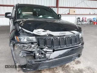 2019 Jeep Grand Cherokee Laredo E with VIN 1C4RJFAG0KC565739, listed as a IAAI auction lot 42039038 with 103,358 mi miles and . Bid and sale history available at DreamBid. Image 6.