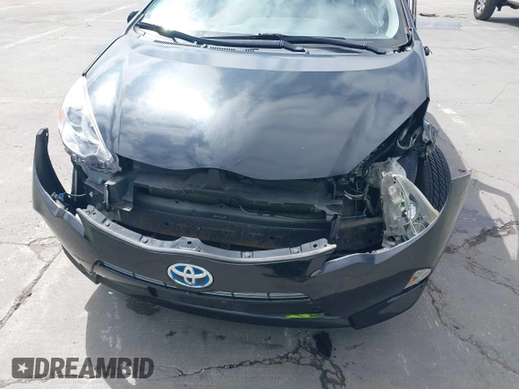 2014 Toyota Prius One z VIN JTDKDTB33E1569335, wystawiony jako IAAI lot #42483772 z przebiegiem Nie podano mil oraz . Historia ofert i sprzedaży dostępna na DreamBid. Obrazek 16.