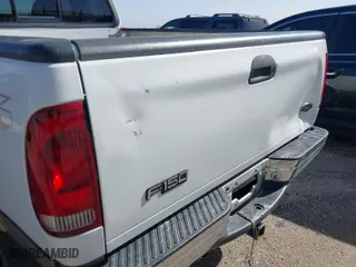 2000 Ford F-150 XL with VIN 1FTRX18W6YNA72319, listed as a IAAI auction lot 41682748 with 265,559 mi miles. Bid and sale history available at carsss.com. Image 15.