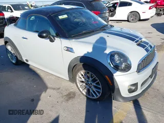 2013 MINI Coupe S with VIN WMWSX3C55DT466540, listed as a IAAI auction lot 41261003 with 147,587 mi miles and . Bid and sale history available at DreamBid. Image 1.