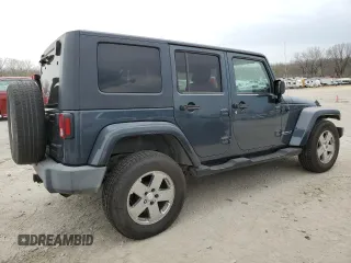 2007 Jeep Wrangler Unlimited Sahara z VIN 1J4GB59147L165439, wystawiony jako Copart lot #50794065 z przebiegiem 255 385 mil mil oraz Szkoda całkowita • Salvage title. Historia ofert i sprzedaży dostępna na DreamBid. Obrazek 3.