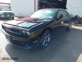 2014 Dodge Challenger SXT with VIN 2C3CDYAG7EH311556, listed as a IAAI auction lot 41868774 with 176,764 mi miles. Bid and sale history available at carsss.com. Image 2.