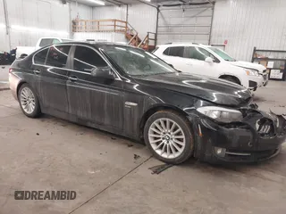 2011 BMW 5 Series 535i xDrive with VIN WBAFU7C58BC778429, listed as a IAAI auction lot 41554736 with 129,163 mi miles. Bid and sale history available at carsss.com. Image 1.