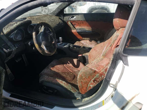 2011 Audi R8 5.2L z VIN WUAANAFG8BN000143, wystawiony jako Copart lot #74799504 z przebiegiem Nie podano mil oraz Szkoda całkowita • Salvage title. Historia ofert i sprzedaży dostępna na DreamBid. Obrazek 7.