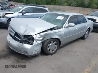 2002 Cadillac DeVille z VIN 1G6KD54Y22U108080, wystawiony jako IAAI lot #42304179 z przebiegiem 278 141 mil mil oraz . Historia ofert i sprzedaży dostępna na DreamBid. Obrazek 17.