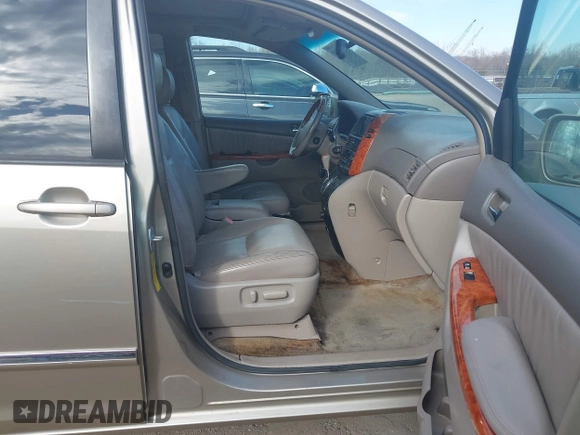 2006 Toyota Sienna XLE with VIN 5TDZA22C16S571350, listed as a IAAI auction lot 41725551 with 233,487 mi miles. Bid and sale history available at carsss.com. Image 5.