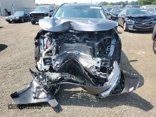 2024 Toyota RAV4 XLE with VIN 2T3P1RFVXRC484711, listed as a Copart auction lot 60511415 with 9,836 mi miles and Salvage title. Bid and sale history available at DreamBid. Image 5.