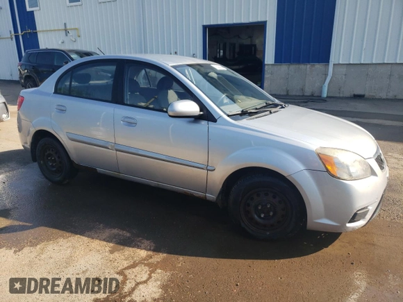 2011 Kia Rio with VIN KNADH4B32B6915275, listed as a Copart auction lot 71546484 with 297,998 mi miles and Salvage Title. Bid and sale history available at DreamBid. Image 4.