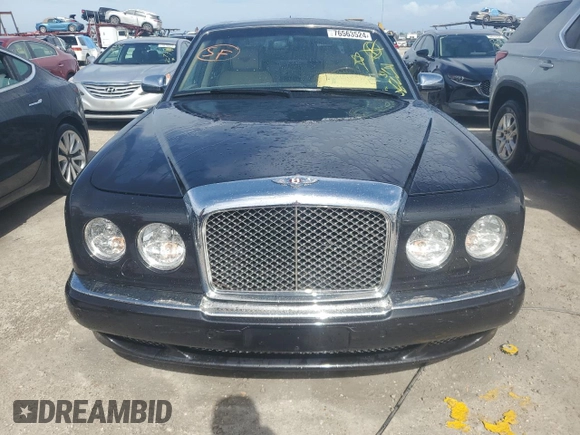 2006 Bentley Arnage R с VIN SCBLC37F26CX11385, выставлен на аукционе Copart как лот 76563524 с пробегом 23 197 миль миль и Списание • Salvage title. История ставок и продаж доступна на DreamBid. Изображение 5.