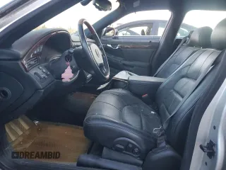 2002 Cadillac DeVille DHS z VIN 1G6KE57Y02U304933, wystawiony jako Copart lot #86919134 z przebiegiem Nie podano mil oraz Czysty tytuł • Clean title. Historia ofert i sprzedaży dostępna na DreamBid. Obrazek 7.