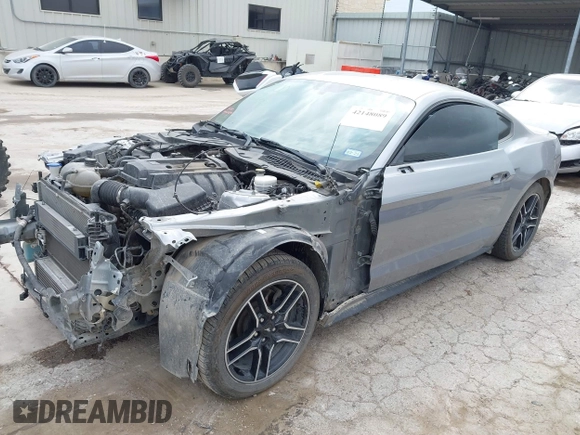 2020 Ford Mustang EcoBoost with VIN 1FA6P8TH9L5139174, listed as a IAAI auction lot 42148089 with 115,979 mi miles and . Bid and sale history available at DreamBid. Image 2.