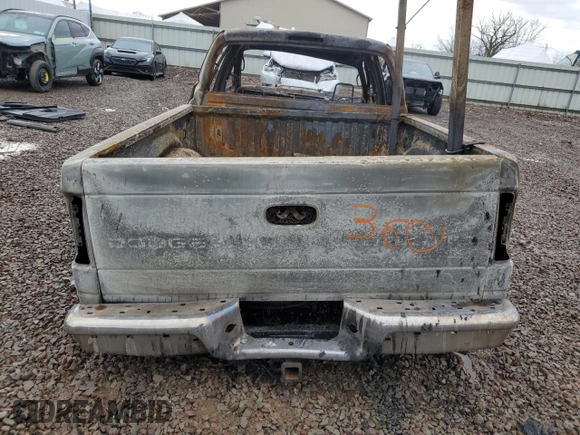 2004 Dodge Dakota SLT z VIN 1D7HL48N84S697094, wystawiony jako Copart lot #50593765 z przebiegiem Nie podano mil oraz Szkoda całkowita • Salvage title. Historia ofert i sprzedaży dostępna na DreamBid. Obrazek 6.