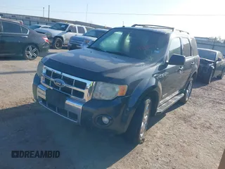 2008 Ford Escape Limited with VIN 1FMCU94188KE48829, listed as a IAAI auction lot 41980759 with 214,466 mi miles. Bid and sale history available at carsss.com. Image 2.