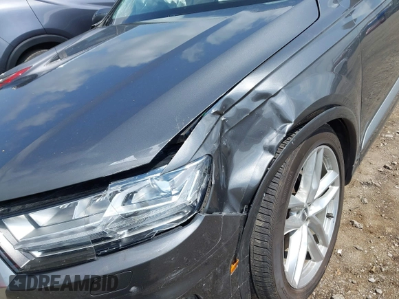 2018 Audi Q7 Prestige with VIN WA1VAAF75JD036199, listed as a IAAI auction lot 42557507 with 104,644 mi miles and . Bid and sale history available at DreamBid. Image 18.